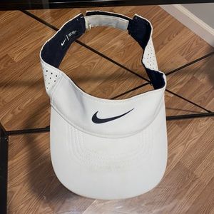 Grey Nike visor hat.